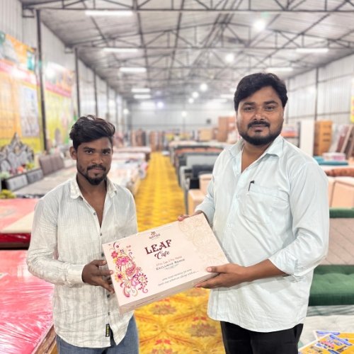 Pleased customer showing their purchase from Leeway Furniture 4